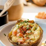Air Fryer Baked Potatoes Served with Herbs