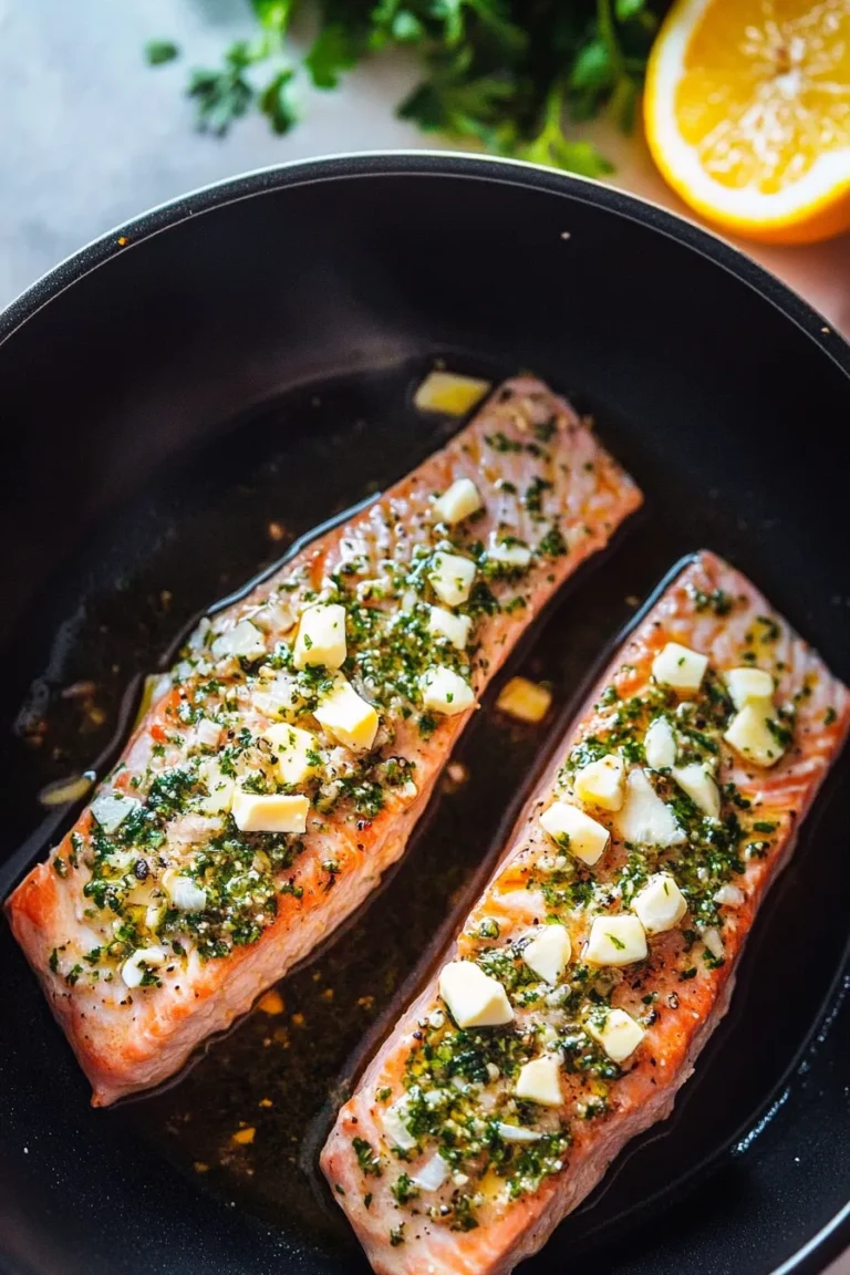 Garlic Herb Roasted Salmon on a White Plate