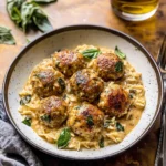 Crockpot Garlic Butter Chicken Meatballs with Creamy Orzo